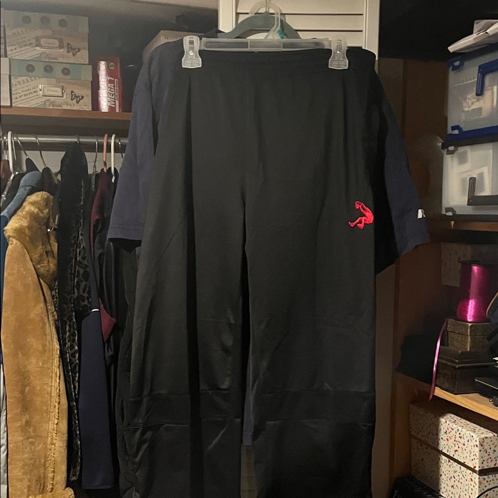 Black Pants with Vibrant Red Logo